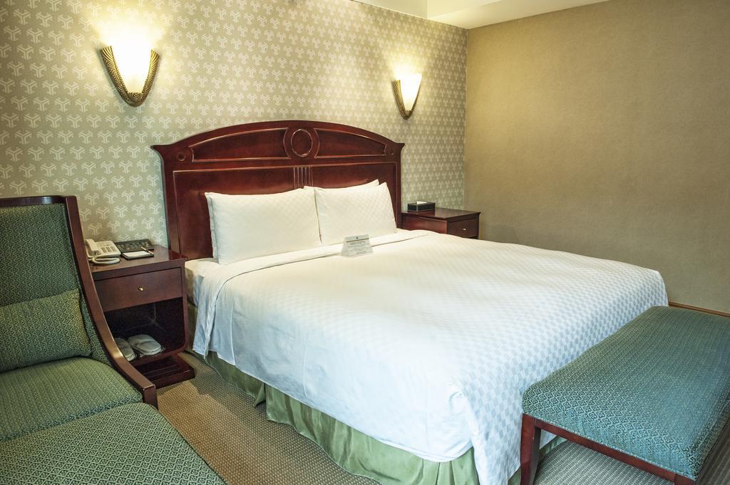 Royal Palace Hotel Taipé Quarto foto