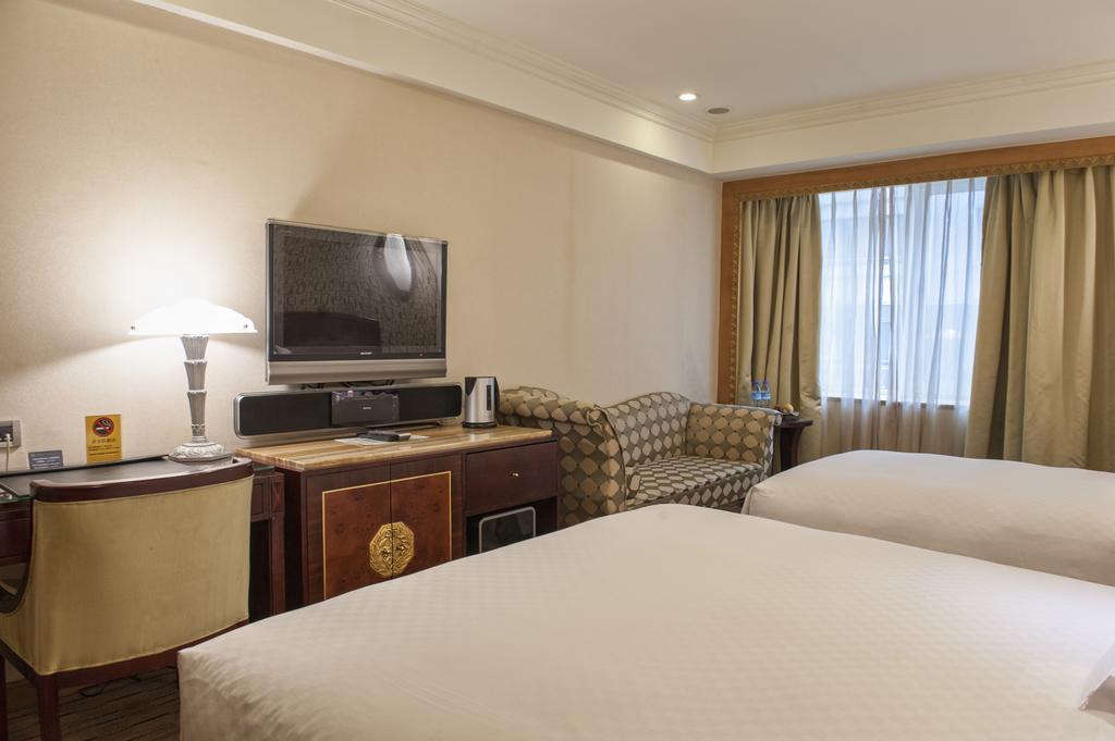 Royal Palace Hotel Taipé Quarto foto